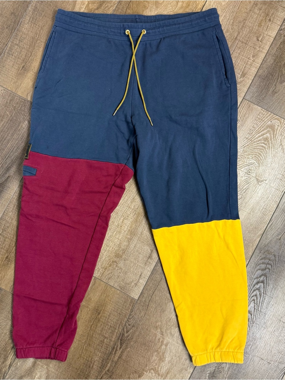 New Balance Kids Colorblock Sweatpants in Navy, Burgundy & Yellow